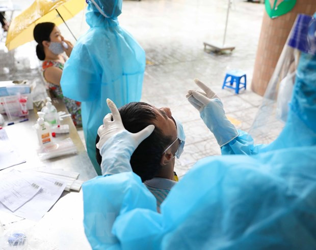 2月3日越南报告新增确诊病例8601例 新增治愈病例超2.5万例 ảnh 1