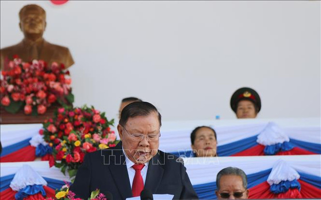 老挝隆重举行人民军建军70周年纪念集会 ảnh 2