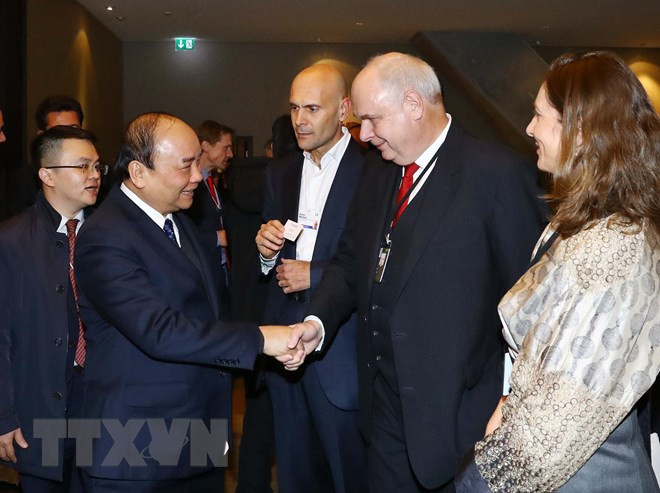 WEF Davos 2019: 越南政府总理阮春福与世界跨国集团负责人进行对话 ảnh 2 WEF Davos 2019: 越南政府总理阮春福与世界跨国集团负责人进行对话 ảnh 2