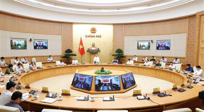 政府总理阮春福：提高警惕 不得掉以轻心 避免疫情陷入失控局面 ảnh 2