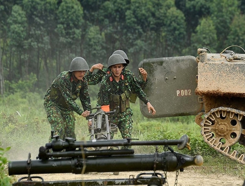 在国际舞台上发挥“铜腿铁肩,打赢射中”的传统 ảnh 1 在国际舞台上发挥“铜腿铁肩,打赢射中”的传统 ảnh 1