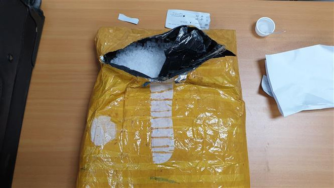 越南西宁省木牌口岸海关破获一起跨境毒品案 缴获毒品7千克 ảnh 1 越南西宁省木牌口岸海关破获一起跨境毒品案 缴获毒品7千克 ảnh 1