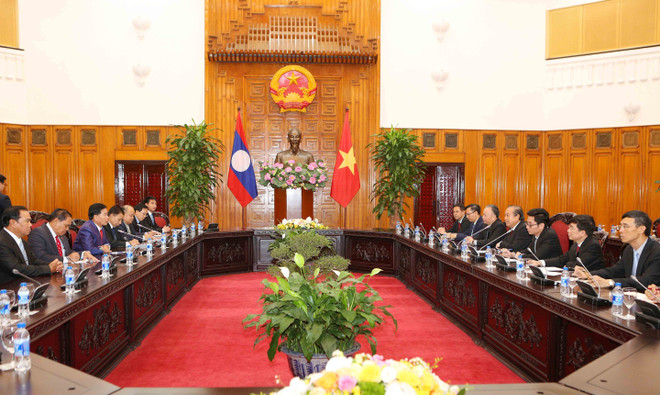 越南政府常务副总理张和平会见万象市委书记兼市长辛拉冯·库派吞 ảnh 2