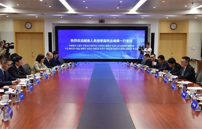 越南人民报与中国人民日报加强合作 ảnh 2 越南人民报与中国人民日报加强合作 ảnh 2