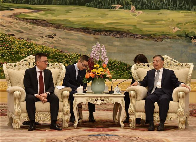 越南人民报与中国人民日报加强合作 ảnh 1 越南人民报与中国人民日报加强合作 ảnh 1
