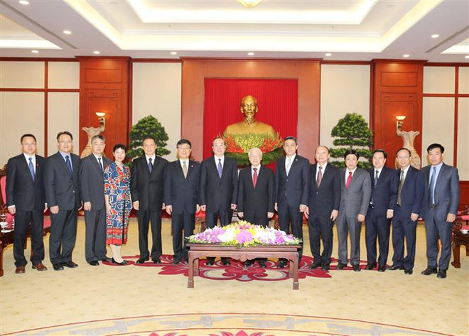 越共中央总书记阮富仲会见中国共产党代表团 ảnh 2