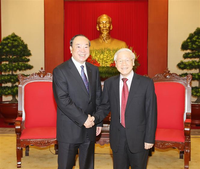 越共中央总书记阮富仲会见中国共产党代表团 ảnh 1