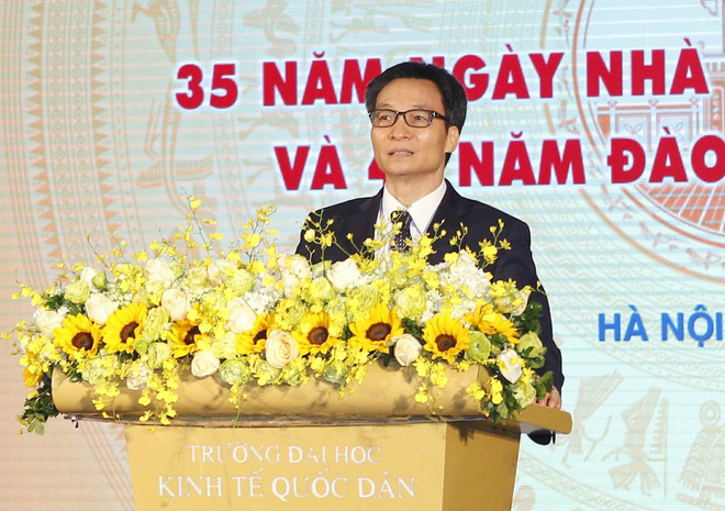 政府副总理武德儋出席国民经济大学的11.20越南教师节35周年纪念典礼 ảnh 1