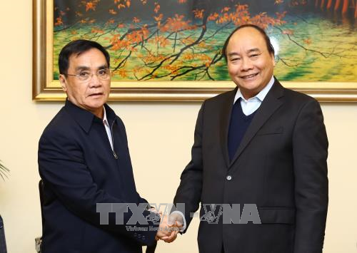 政府总理阮春福会见老挝和瑞典客人 ảnh 1