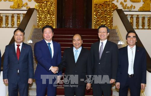 越南政府总理阮春福会见韩国鲜京集团董事长崔泰源 ảnh 1 越南政府总理阮春福会见韩国鲜京集团董事长崔泰源 ảnh 1