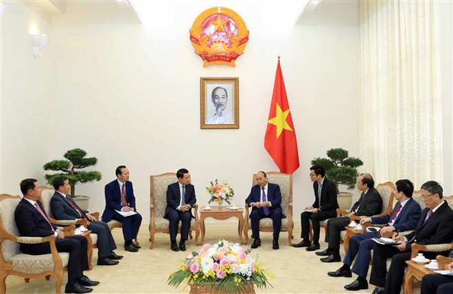 越南总理阮春福会见老挝外交部长沙伦赛 ảnh 2
