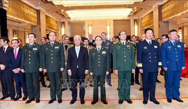 越南人民军建军75周年和全民国防日30周年纪念典礼在中国举行 ảnh 2 越南人民军建军75周年和全民国防日30周年纪念典礼在中国举行 ảnh 2