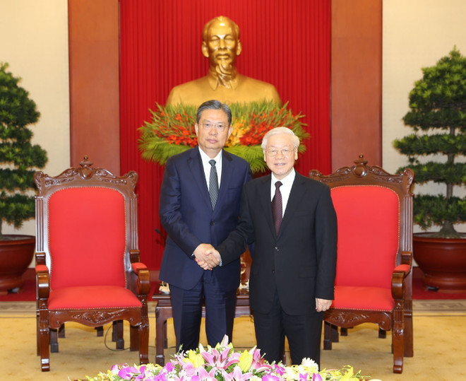 越共中央总书记阮富仲会见中共中央纪律检查委员会书记赵乐际 ảnh 1