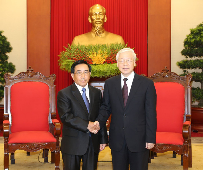 越共中央总书记阮富仲会见老挝党、国家高级代表团 ảnh 1 越共中央总书记阮富仲会见老挝党、国家高级代表团 ảnh 1