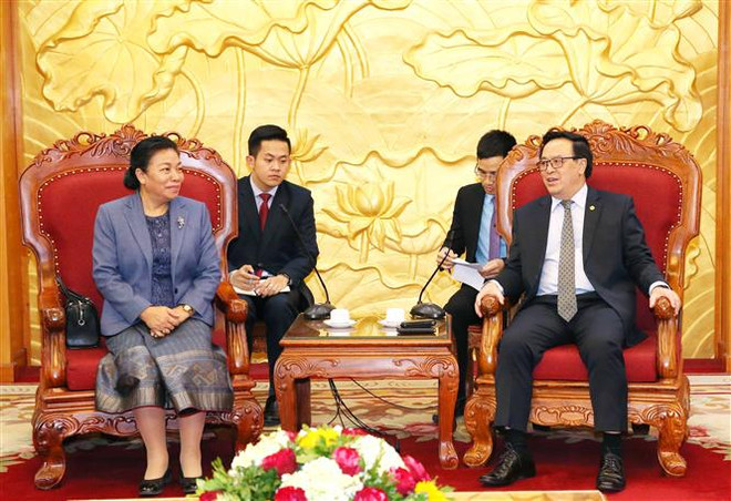 越共中央对外部部长黄平君会见老挝革命人民党中央对外部代表团 ảnh 1 越共中央对外部部长黄平君会见老挝革命人民党中央对外部代表团 ảnh 1