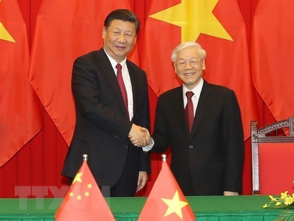 越中两国领导人就两国建交71周年互致贺电 ảnh 1 越中两国领导人就两国建交71周年互致贺电 ảnh 1