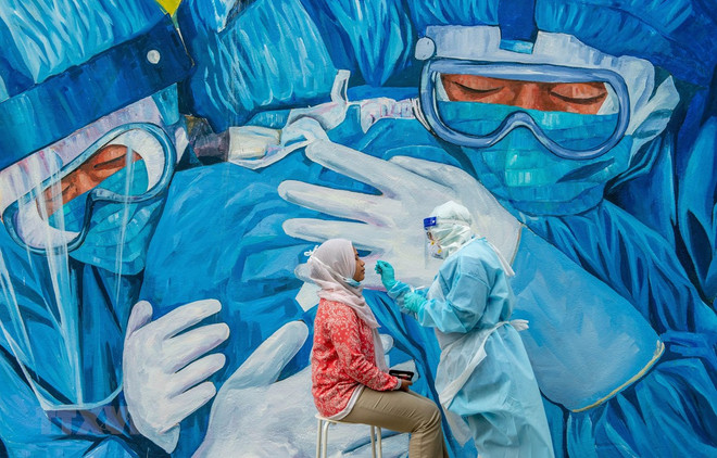 马来西亚重新实行封锁令 新加坡加快新冠病毒疫苗接种工作 ảnh 1 马来西亚重新实行封锁令 新加坡加快新冠病毒疫苗接种工作 ảnh 1