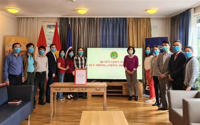 旅外越南人积极参加疫情防控捐赠活动 ảnh 1 旅外越南人积极参加疫情防控捐赠活动 ảnh 1