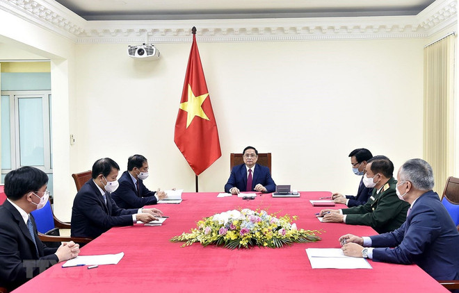 越南政府总理范明政与中国国务院总理李克强通电话 ảnh 1