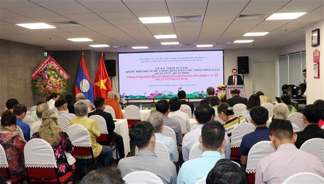 纪念老挝国庆45周年见面会在胡志明市举行 ảnh 1 纪念老挝国庆45周年见面会在胡志明市举行 ảnh 1