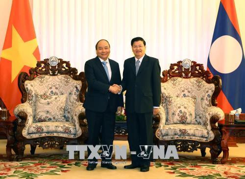 越老两国政府总理共同主持召开越老政府间联合委员会第40次会议 ảnh 1 越老两国政府总理共同主持召开越老政府间联合委员会第40次会议 ảnh 1