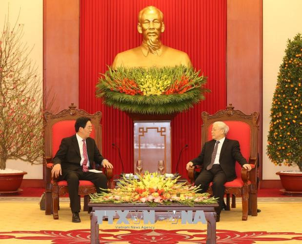 越共中央总书记阮富仲会见离任拜会的中国驻越大使洪小勇 ảnh 1 越共中央总书记阮富仲会见离任拜会的中国驻越大使洪小勇 ảnh 1