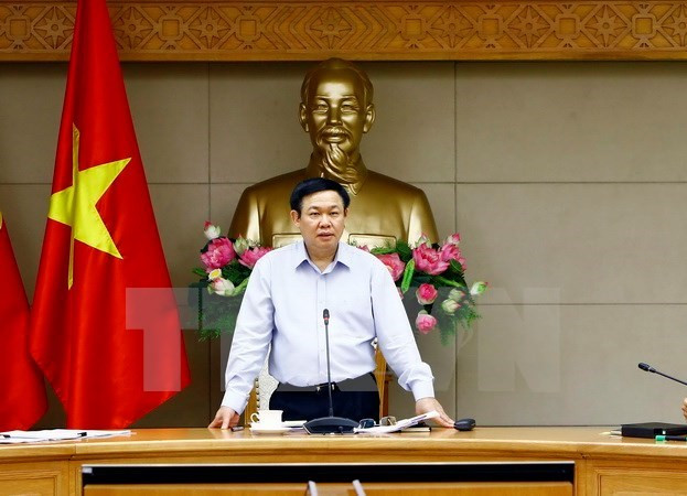 越南政府副总理责成向4个省份贫困者发放大米 ảnh 1