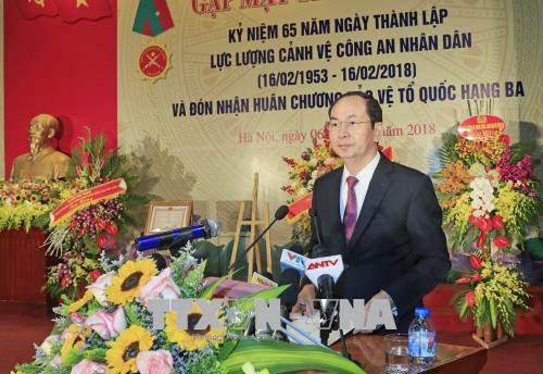 越南国家主席陈大光出席人民公安警卫力量成立65周年典礼 ảnh 1