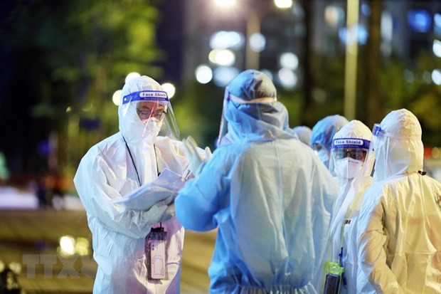 越南国家主席：及时奖励疫情防控中表现突出的先进典型 ảnh 1