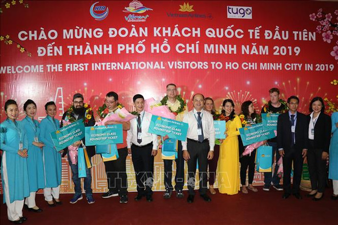 越航迎来2019年第一批外国游客 ảnh 2 越航迎来2019年第一批外国游客 ảnh 2