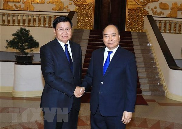 老挝总理赴越出席越老政府间合作委员会第41次会议 ảnh 1 老挝总理赴越出席越老政府间合作委员会第41次会议 ảnh 1