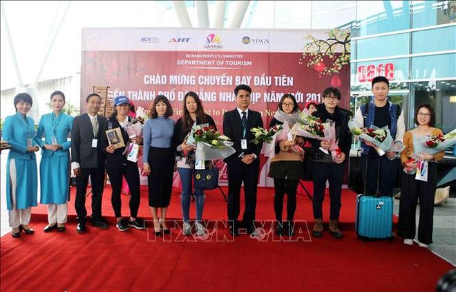 越航迎来2019年第一批外国游客 ảnh 3 越航迎来2019年第一批外国游客 ảnh 3