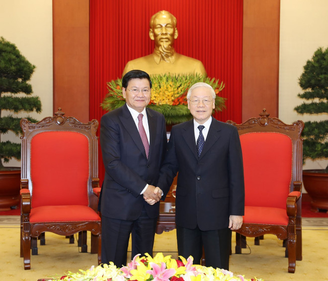 越共中央总书记、国家主席阮富仲会见老挝总理通伦 ảnh 1 越共中央总书记、国家主席阮富仲会见老挝总理通伦 ảnh 1