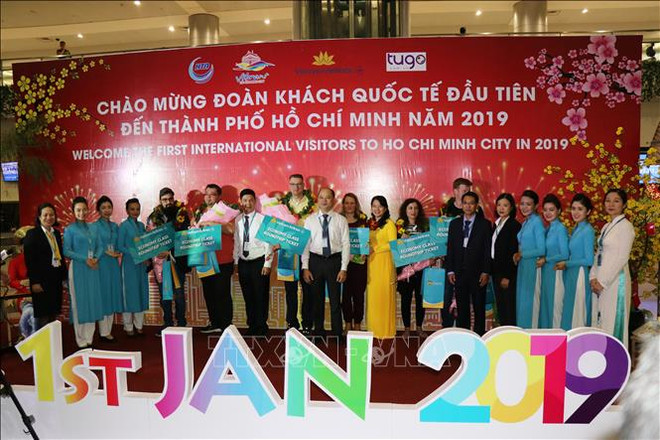 越航迎来2019年第一批外国游客 ảnh 1 越航迎来2019年第一批外国游客 ảnh 1