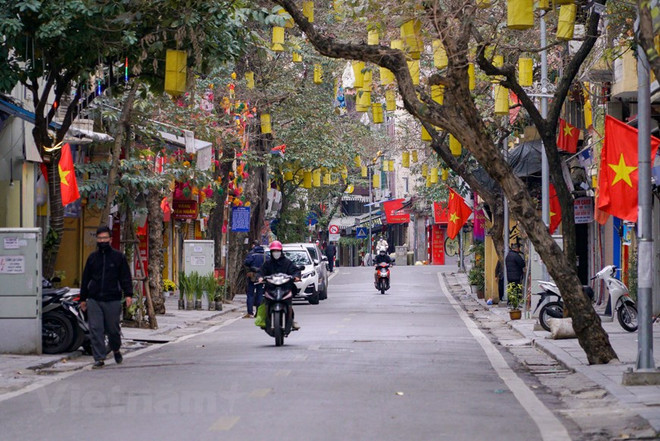组图:2022壬寅年大年初一祥和宁静的河内街道 ảnh 5 组图:2022壬寅年大年初一祥和宁静的河内街道 ảnh 5