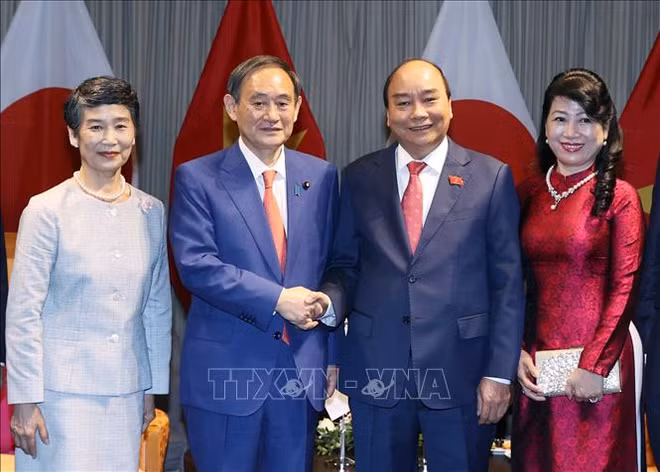  日媒对日本首相菅义伟对越南的正式访问给予高度关注并密集报道 ảnh 1