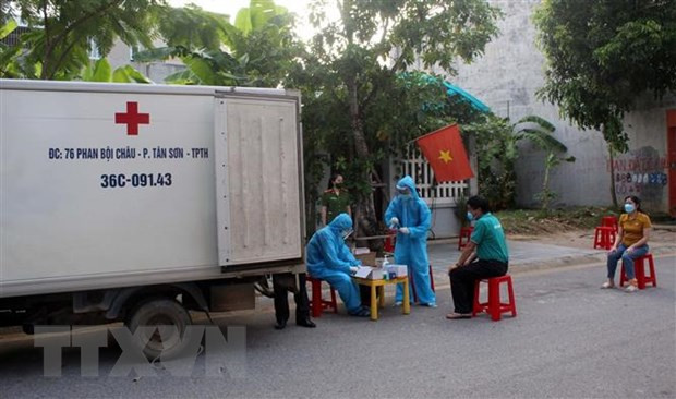 清化省在宜山港接受确诊新冠肺炎的2名外籍船员 ảnh 1 清化省在宜山港接受确诊新冠肺炎的2名外籍船员 ảnh 1