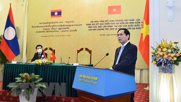 越老双边总结会议联合公报:配合有效开展“一窗口一站式”检查模式 ảnh 2 越老双边总结会议联合公报:配合有效开展“一窗口一站式”检查模式 ảnh 2