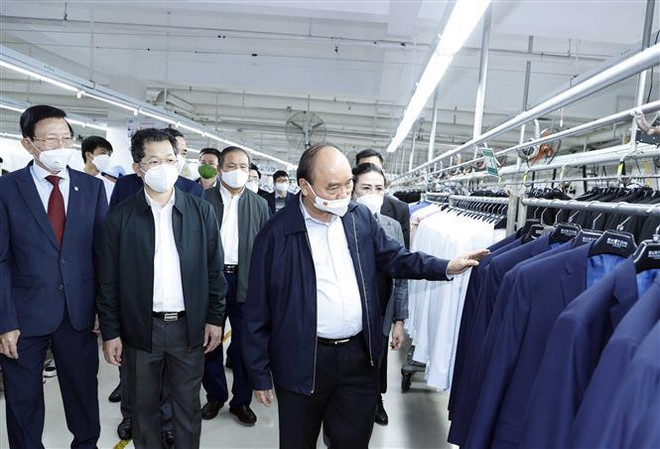 国家主席阮春福:岘港市的成功得益于唤醒人的潜力 ảnh 2 国家主席阮春福:岘港市的成功得益于唤醒人的潜力 ảnh 2