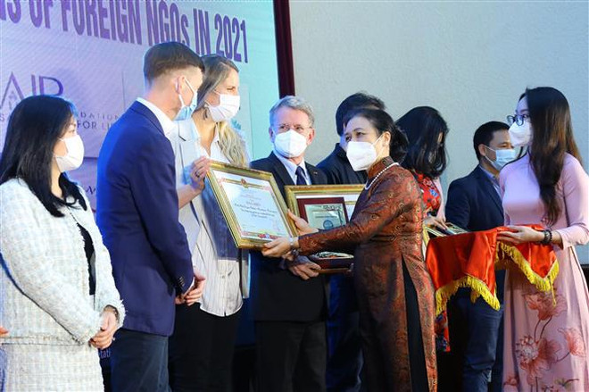 越南希望继续得到境外非政府组织的支持和帮助 ảnh 1