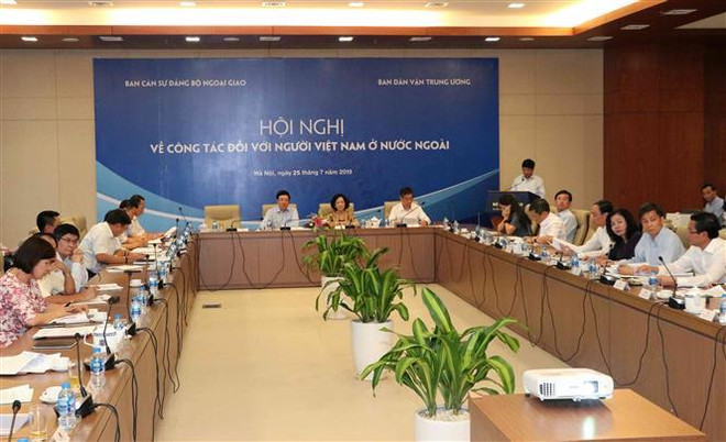 加强民族大团结 充分发挥旅居海外越南人的积极作用 ảnh 1