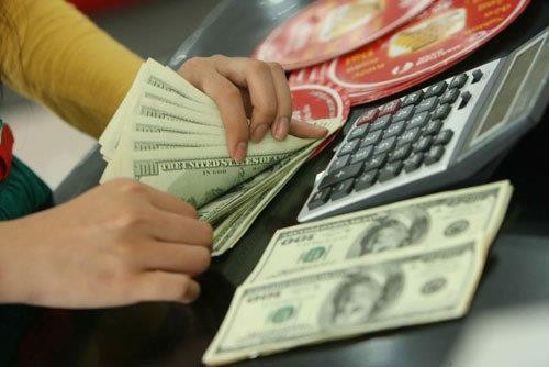 7月24日越盾对美元汇率中间价下调1越盾 ảnh 1