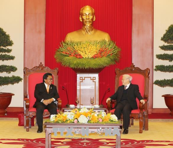 越共中央总书记阮富仲与越南国家主席陈大光会见印尼地方代表理事会主席乌斯曼 ảnh 1 越共中央总书记阮富仲与越南国家主席陈大光会见印尼地方代表理事会主席乌斯曼 ảnh 1