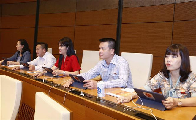 越南第十五届国会第三次会议:表决通过关于批准国家预算决算的决议 ảnh 1 越南第十五届国会第三次会议:表决通过关于批准国家预算决算的决议 ảnh 1