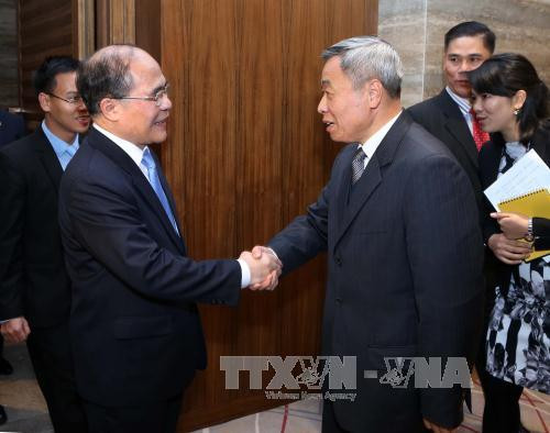 国会主席阮生雄会见中国广东省人大常委会主任黄龙云 ảnh 1