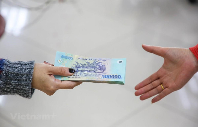 从7月1日起基本工资上涨20%:劳动者喜忧参半 ảnh 1 从7月1日起基本工资上涨20%:劳动者喜忧参半 ảnh 1