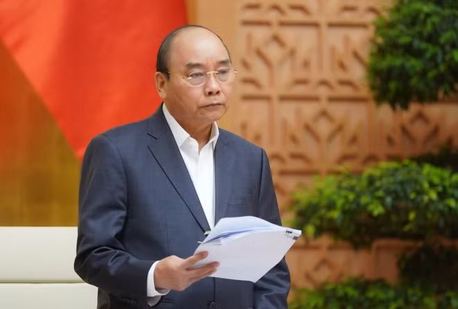 越南政府总理阮春福宣布新冠肺炎疫情已成为全国性疫情 ảnh 1