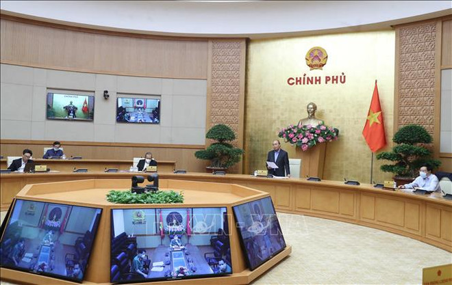 政府总理阮春福:社会增速放缓,但从事防疫工作的人员需提速 ảnh 1 政府总理阮春福:社会增速放缓,但从事防疫工作的人员需提速 ảnh 1