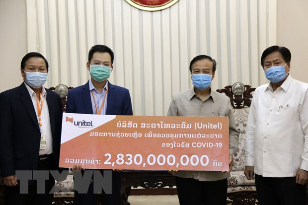 越南企业协助老挝应对新冠肺炎疫情 ảnh 1 越南企业协助老挝应对新冠肺炎疫情 ảnh 1