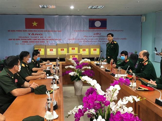 越南国防部派遣专家赴老挝援助新冠肺炎疫情防控工作 ảnh 1 越南国防部派遣专家赴老挝援助新冠肺炎疫情防控工作 ảnh 1